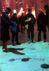 Projected on pavement at Rockefeller Center. Photo (c) 1999 Peter Cunningham.